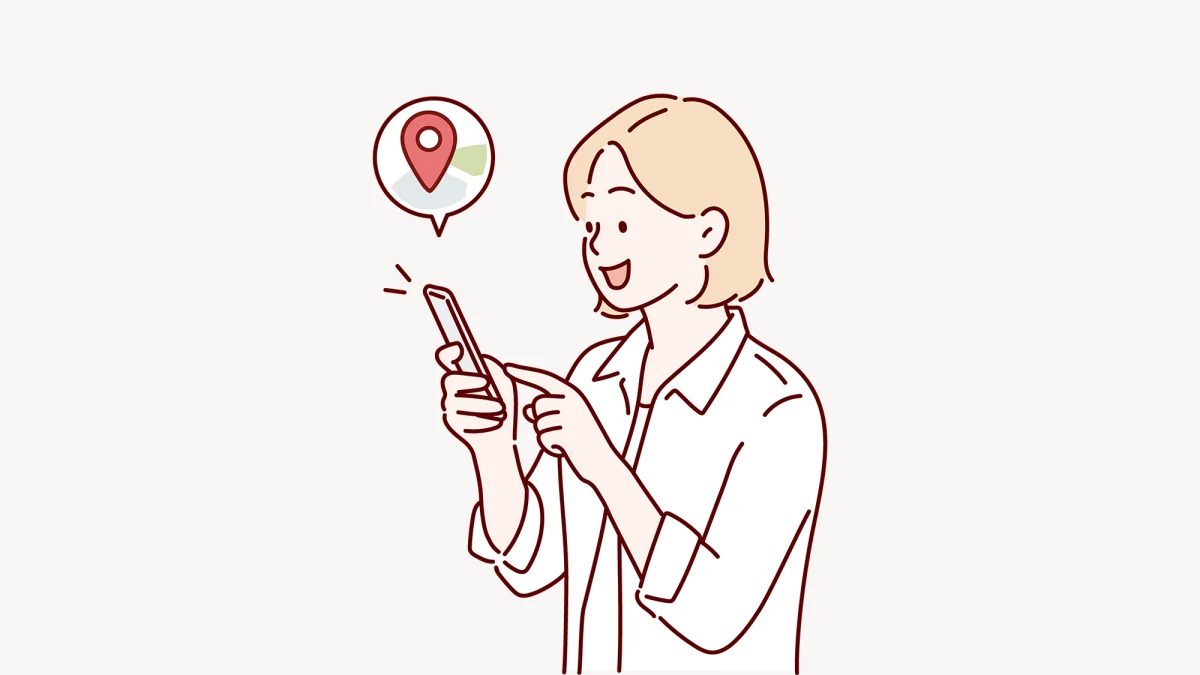 スマートフォンでアクセスマップを確認し、安心してお店へ足を運ぼうとしているお客様のイメージイラスト
